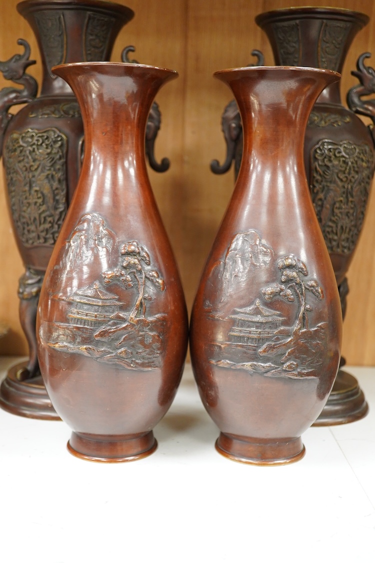 Two pairs of Japanese bronze vases, Meiji period and another, later example, largest 35cm high